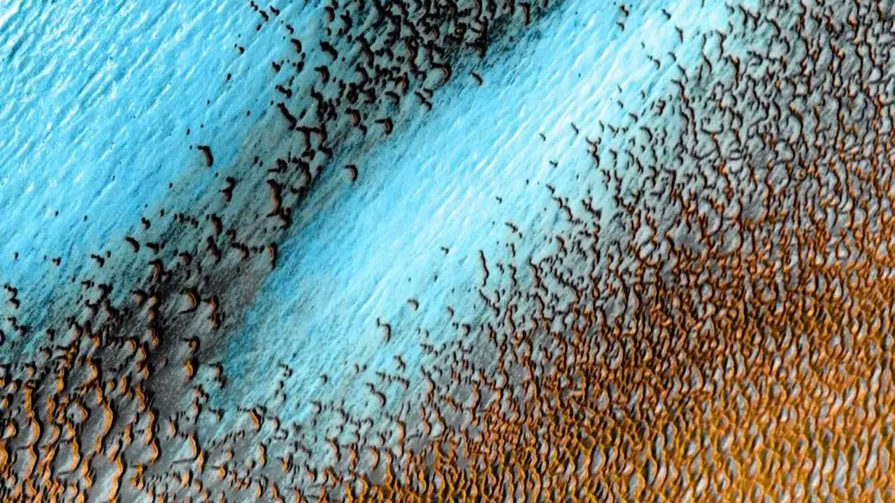 NASA unveils image of sand dunes at the north pole of Mars

