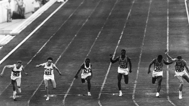 Runners perform the 100-meter series at the 1960 Olympics in Rome.