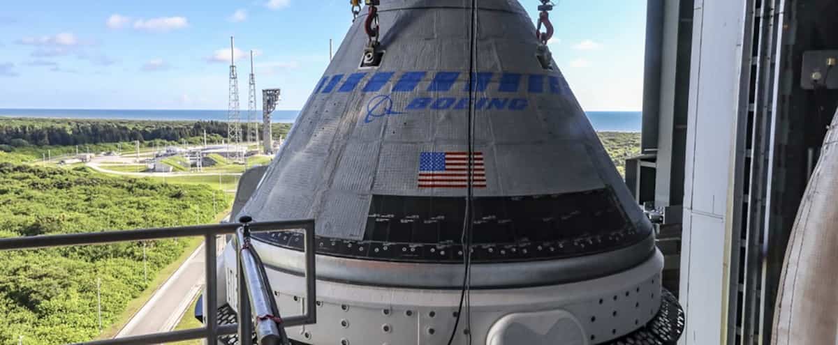 Boeing space capsule returns to factory after months delay

