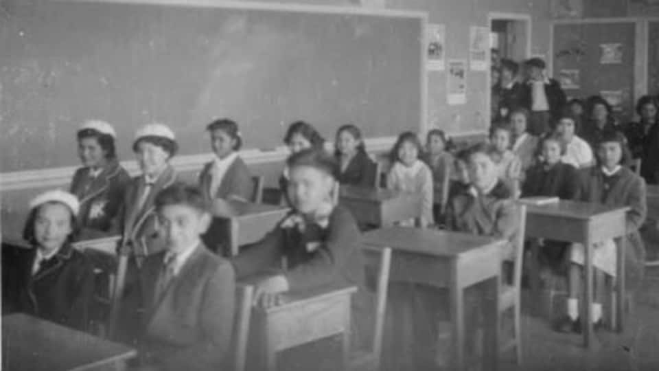 Students in a classroom at Kuper Island boarding school.