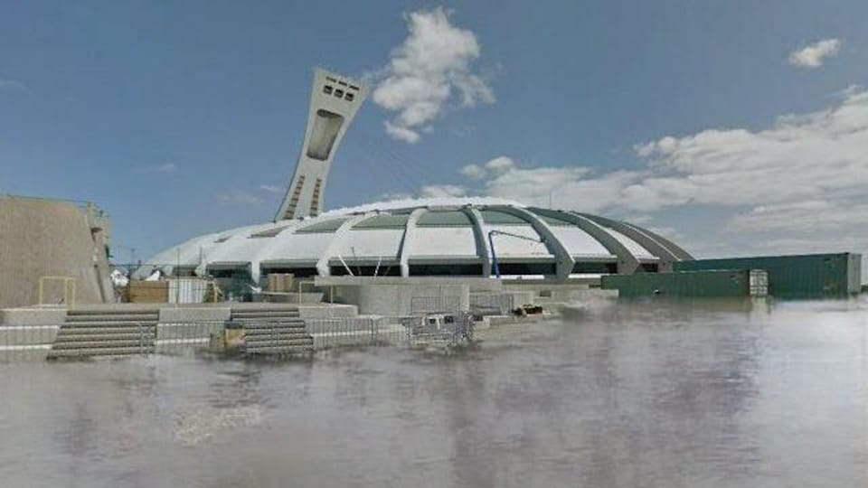 Water surrounds the stadium.