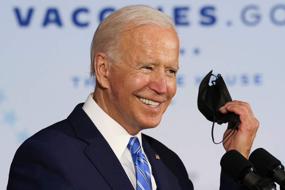 To rally his party, Biden cut spending plans

