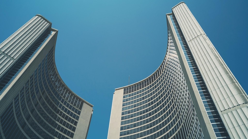 Low angle view of City Hall in Toronto, Ontario.