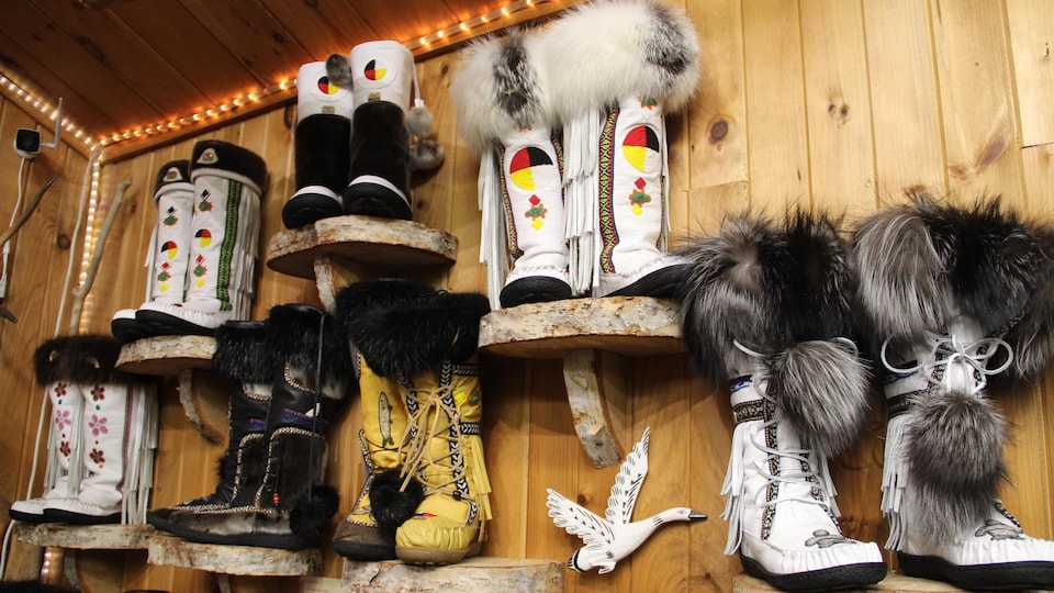 Traditional shoes are on display in the store.