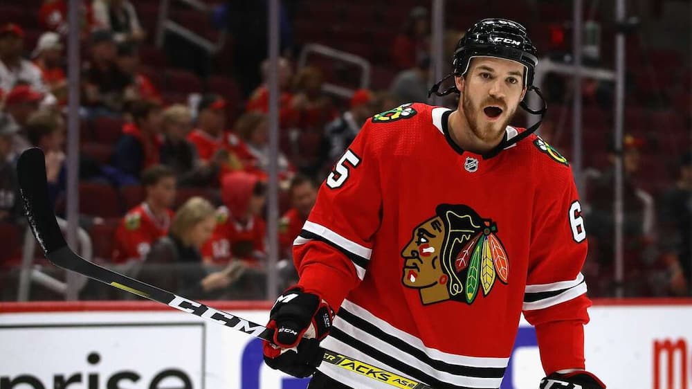 Andrew Shaw protests the safety of the player

