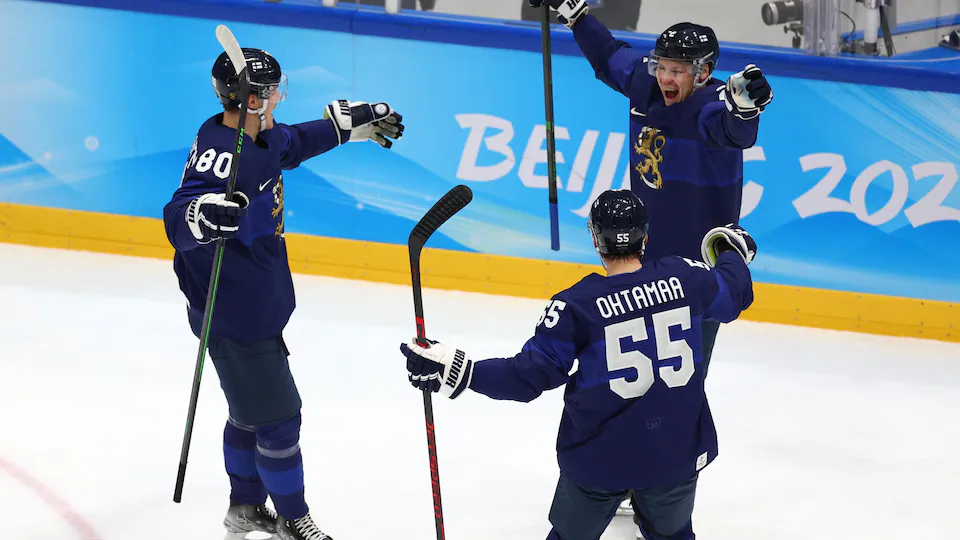 The Finns celebrate a goal in the final.