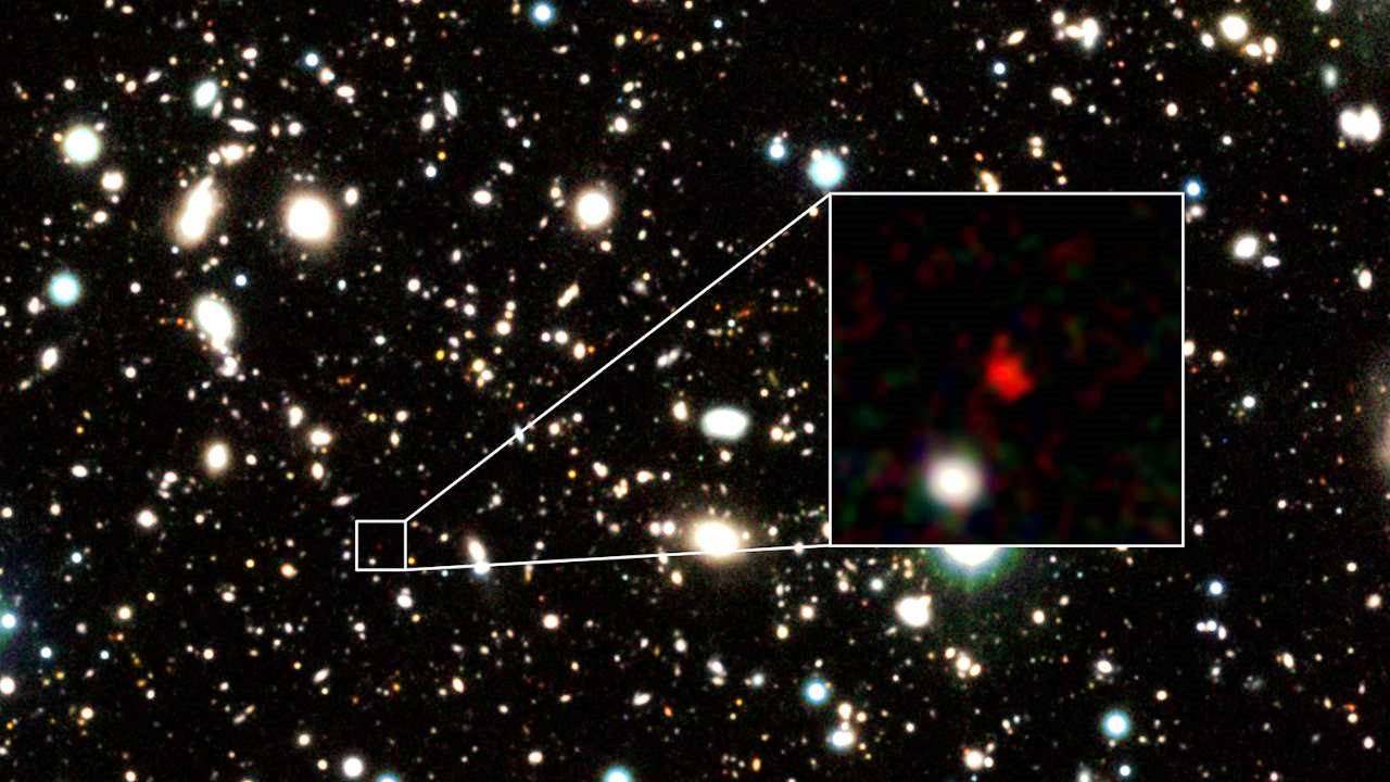 This point may be the most distant galaxy ever discovered: the light has traveled 13.5 billion light-years away.

