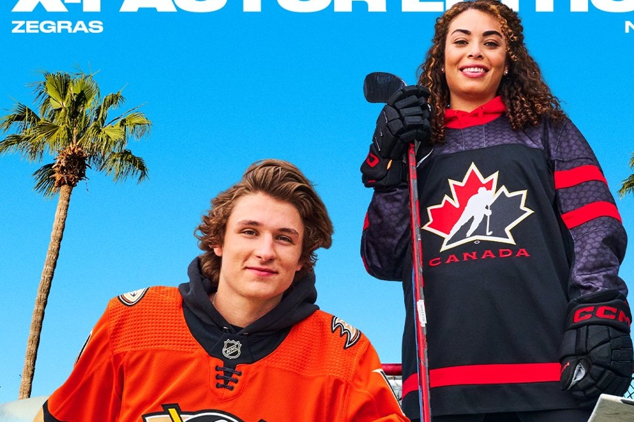 Sarah Norse and Trevor Zegras on the cover of the NHL 23 video game

